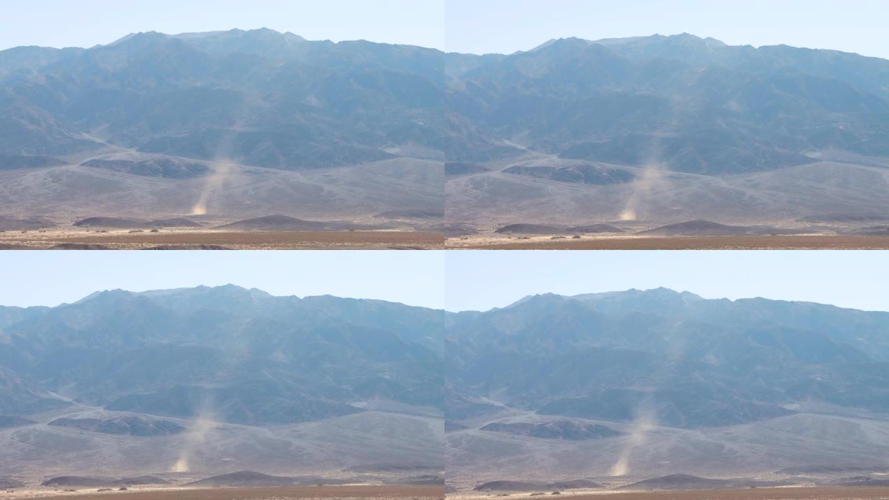 死亡谷国家公园的尘埃魔鬼。沙漠中的小旋风