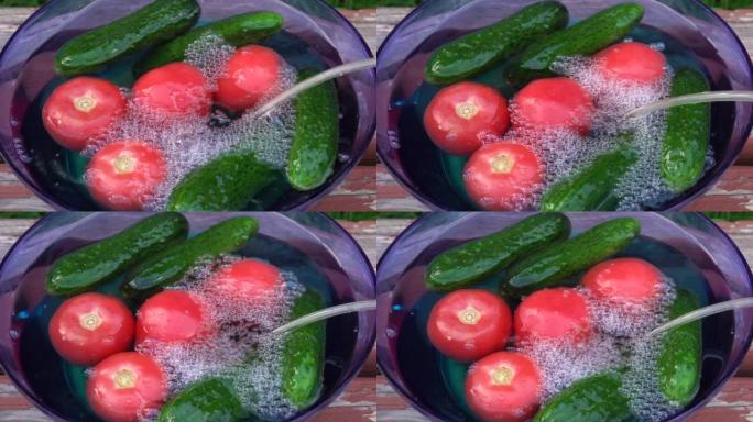 压缩机将臭氧泵入一碗蔬菜中。沸腾的臭氧水。蔬菜加工，健康食品概念。