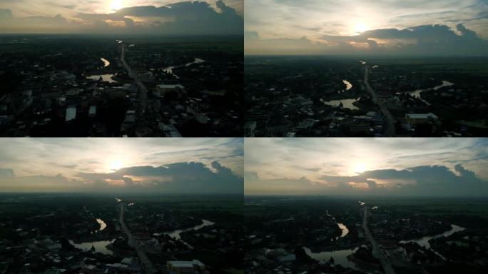 4k电影性质的镜头，一架无人机在美丽的日落期间飞越泰国华富里镇。