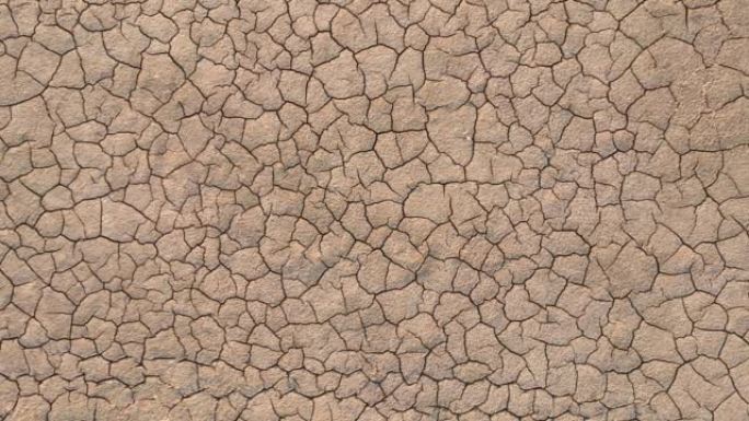 地质学。干涸的河床和湖泊。干旱、全球变暖和气候变化。裂开的干土和土壤。干燥的沙漠，干旱的季节。思想概