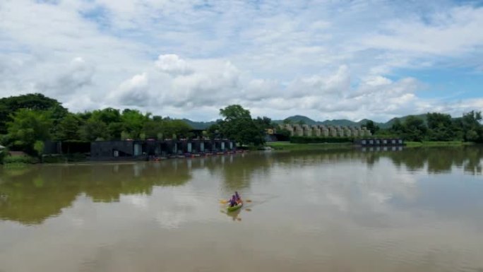 Couple men and women in kayak on the River Kwai in