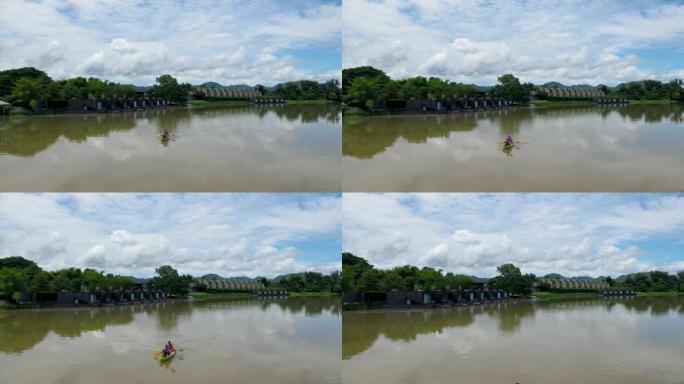 Couple men and women in kayak on the River Kwai in