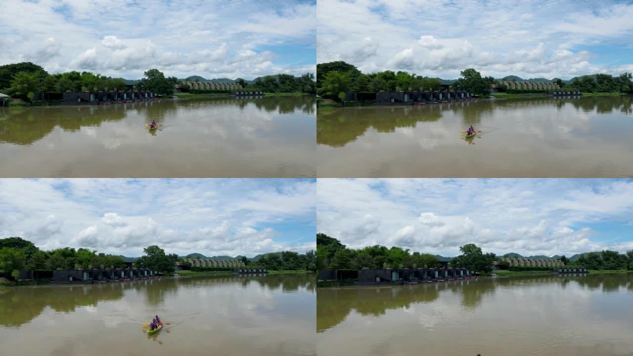 Couple men and women in kayak on the River Kwai in