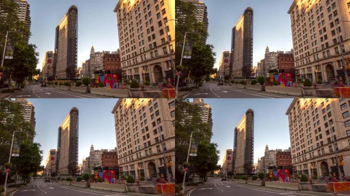 清晨在纽约市，Flay Iron大楼和前景中的街道交通