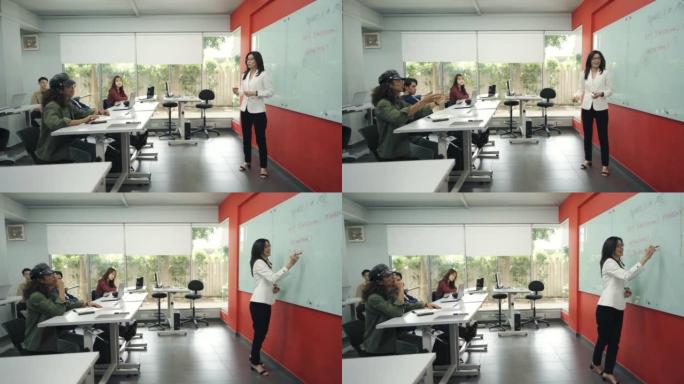 亚洲华人女学院讲师在教室的白板上提问和写答案