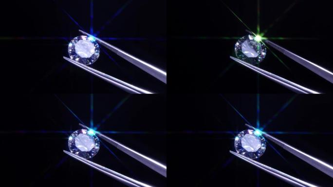 镊子中的钻石选择性聚焦，检查和分析明亮切割的水晶抛光质量。珠宝专业手工制作工作室。宏观拍摄，浅层深度