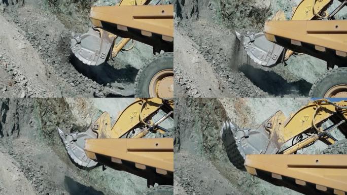 挖掘机挖掘机在露天矿中挖掘石灰石。开发采矿用露天采矿。带电铲的采矿挖掘机，慢动作