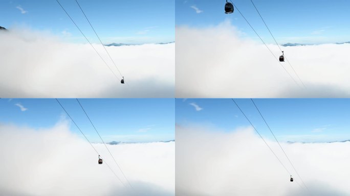 索道缆车观光滑行桥旅游客身影穿梭白云海