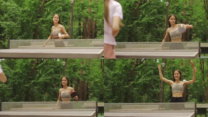 户外乒乓球，青少年在公园里夏天用乒乓球拍打乒乓球，积极休闲