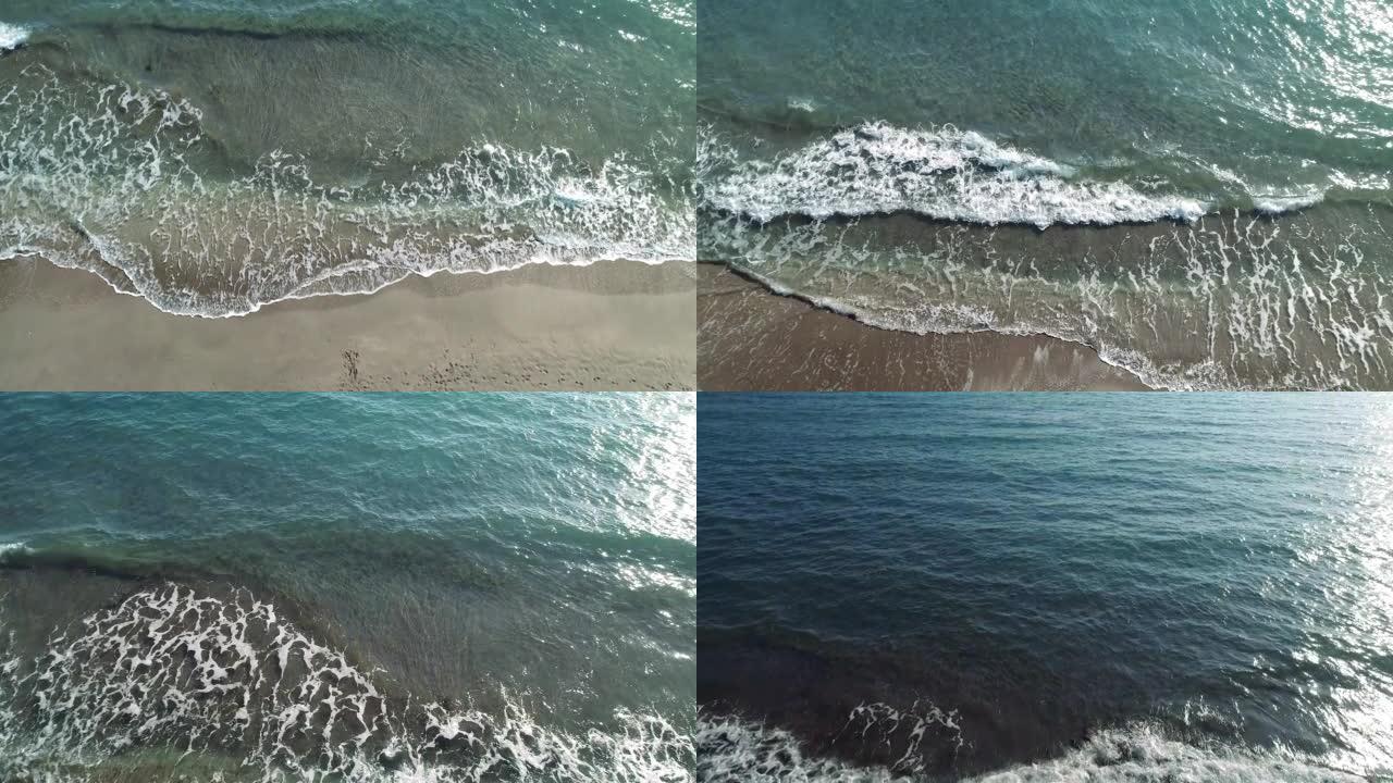 从空中可以看到在安塔利亚帕塔拉坠落的蓝色海浪。安塔利亚帕塔拉