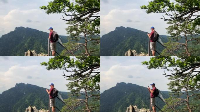 徒步旅行者上山欣赏风景