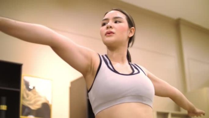 Woman exercising for good health at home