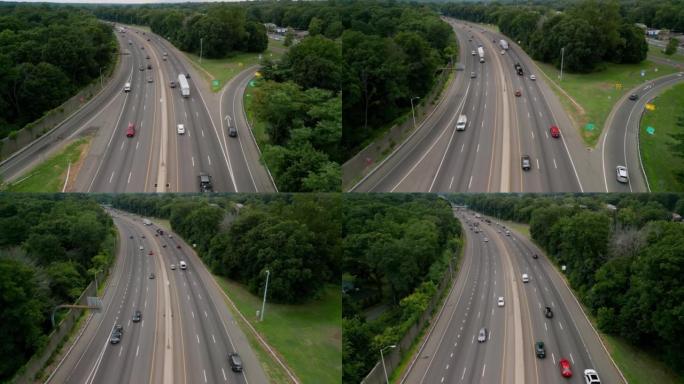 空中无人机拍摄公路上通行的交通。