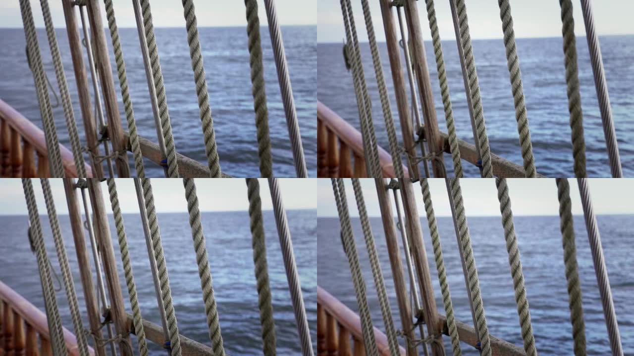 老式木船滑轮和绳索细节旧帆船的护罩和绳索