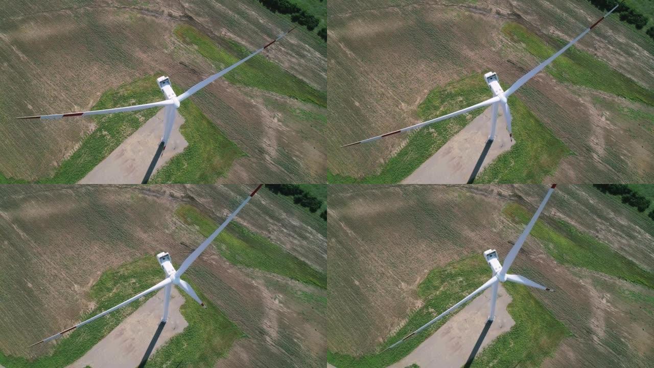 田间风车农场的鸟瞰图。世界能源电力危机。绿色能源生产理念。产生清洁可再生能源的风力涡轮机。高角度拍摄