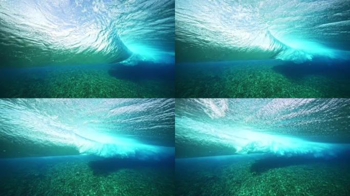 水下塔希提岛4k。美丽的海浪，强大的海浪在慢动作中破碎。南太平洋，Teahupoo。