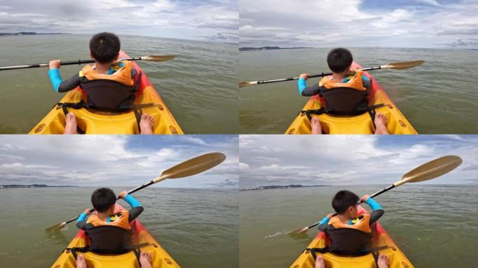 泰国芭堤雅的亚洲男孩划船独木舟