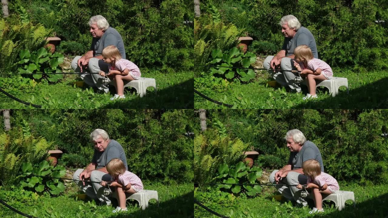 祖父和孙子在夏天日落时钓鱼。一起钓鱼。满头白发的小男孩和老人正拿着鱼竿抓鱼。