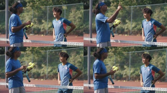 亚洲华裔青年男子网球选手上午练习例行训练时听教练