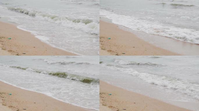海滩上的慢动作泡沫波