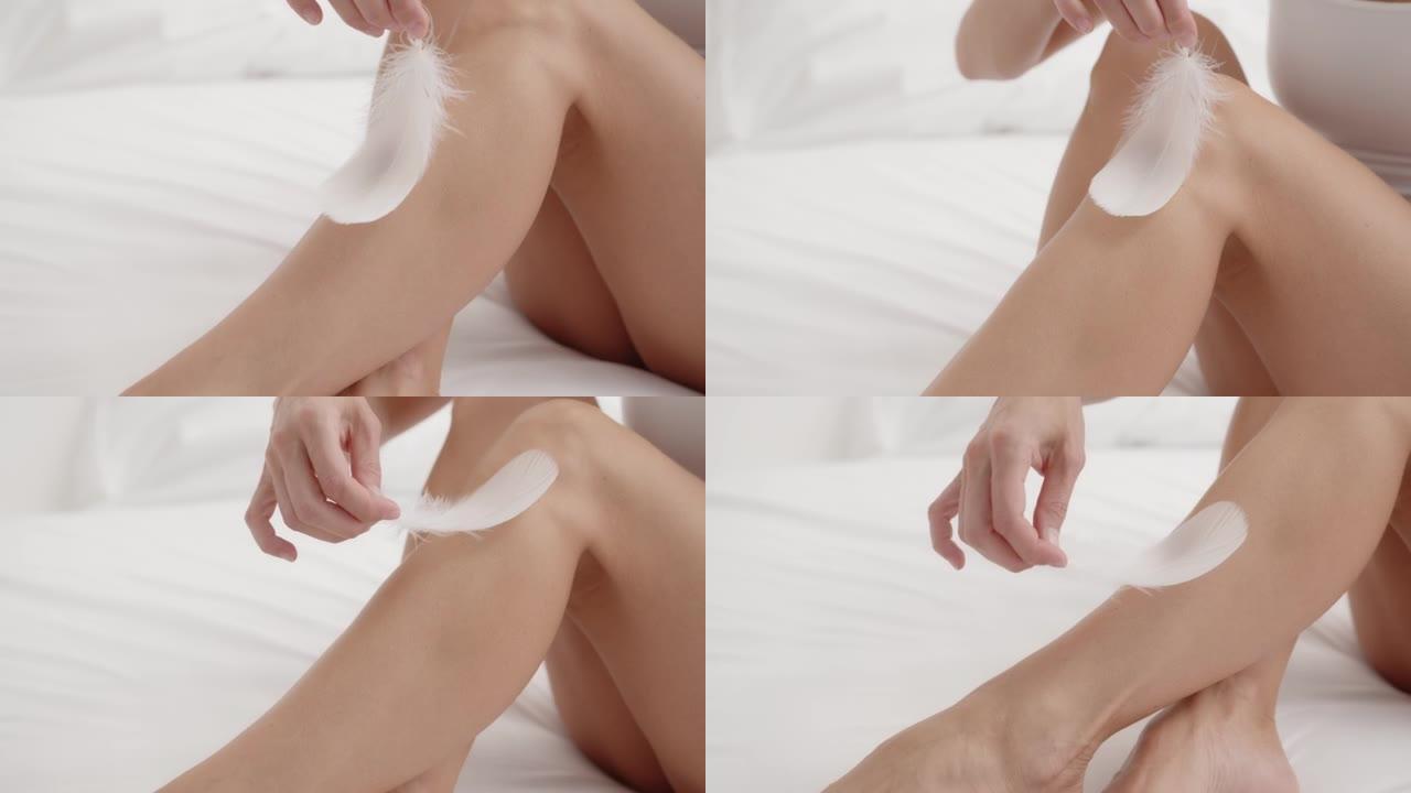 女人长腿，皮肤美丽光滑。美容身体护理概念