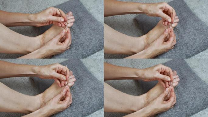 女性足部修脚的特写。脚指甲护理。