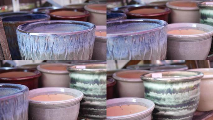 相机在陶瓷或花园商店的陶器上平移