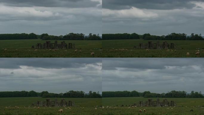 英国，英国，一个阴天的夏日，史前巨石圈巨石阵前移动绵羊的时间流逝