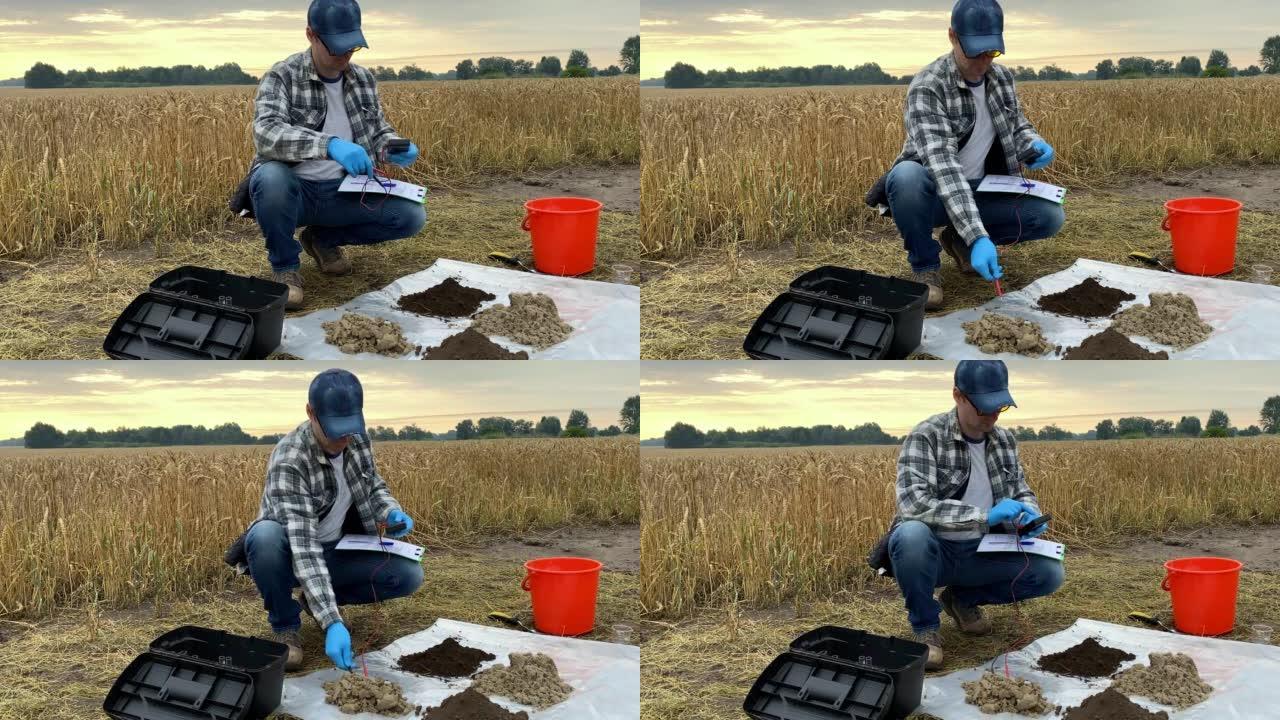 农学家利用数字室外土壤测试仪准备测量