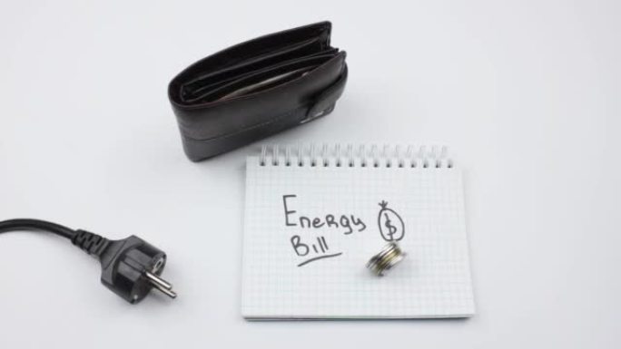 能源账单的概念包括电力，公用事业，取暖。能源账单，钱包，电线和收据。电力，能源，服务费用。