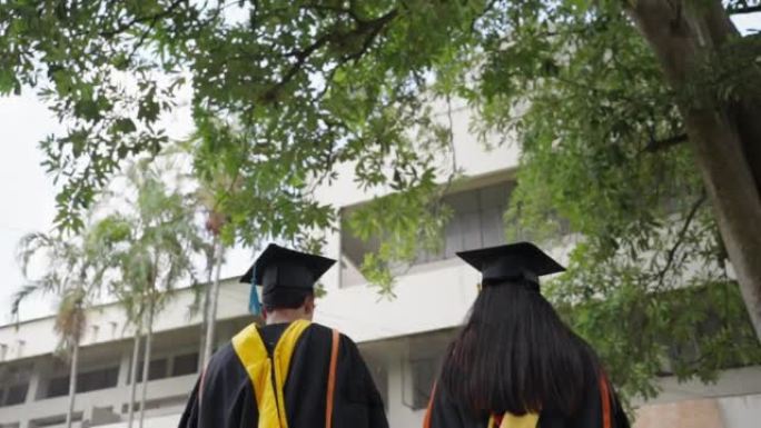 学生庆祝教育毕业学生成功学习概念仪式在大学学士和硕士学位