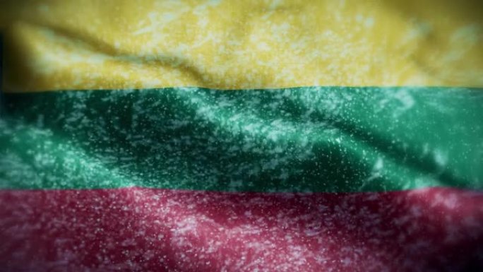 4K暴风雪/雪在立陶宛国旗股票视频。冷淡的立陶宛国旗。旋转/旋转的冰晶。雪花掠过立陶宛国旗。