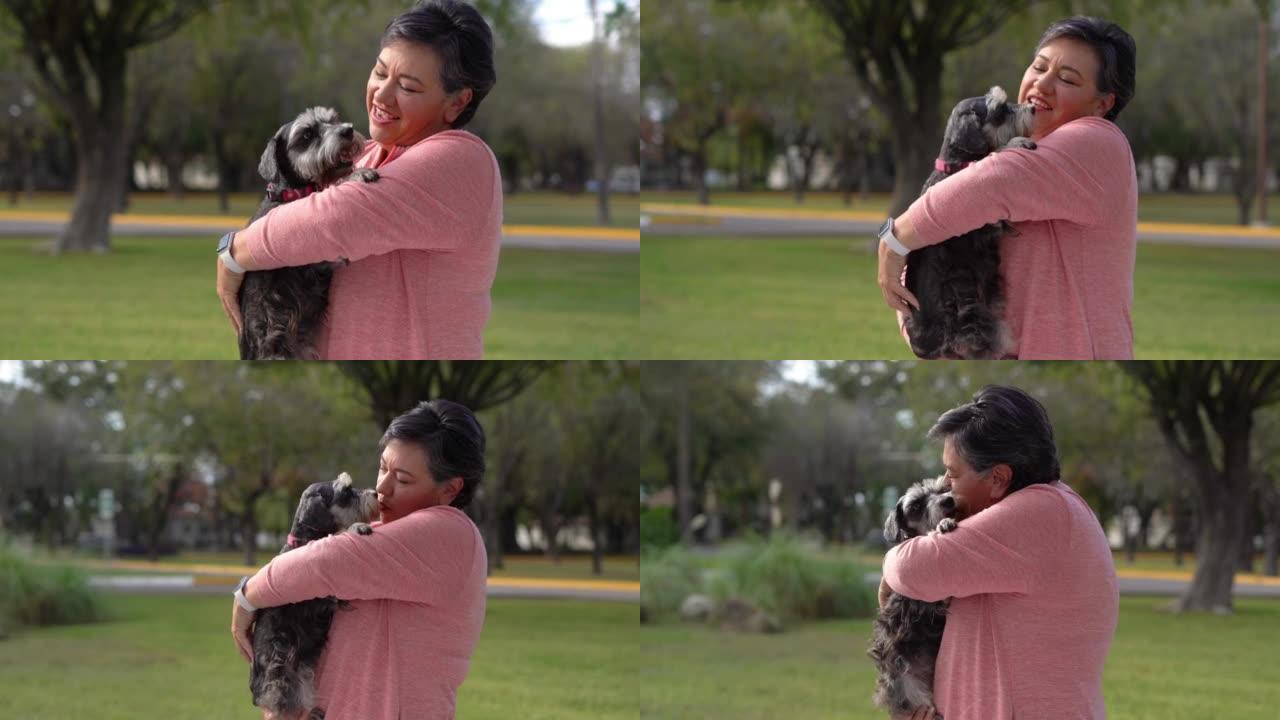 Happy  woman with schnauzer dog