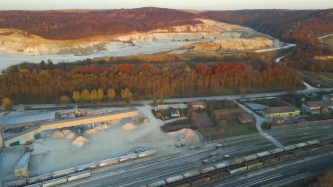 Aerial view of cargo train loaded with crushed sto