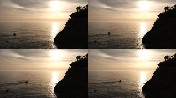五渔村马纳罗拉码头和日落蓬塔邦菲里奥视点的悬崖。