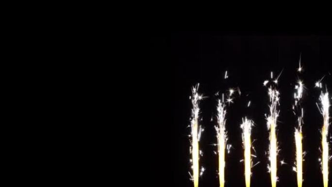 庆祝概念。节日视频框架。黑色背景上燃烧的孟加拉喷泉蜡烛。烟火，烟火烟火。节日孤立的背景。