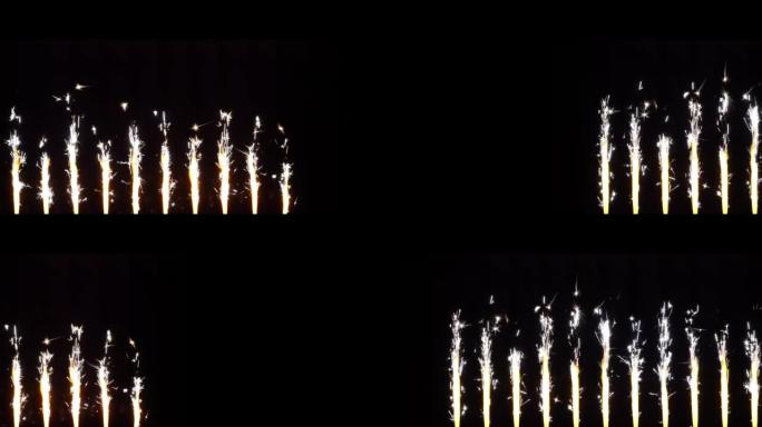 庆祝概念。节日视频框架。黑色背景上燃烧的孟加拉喷泉蜡烛。烟火，烟火烟火。节日孤立的背景。