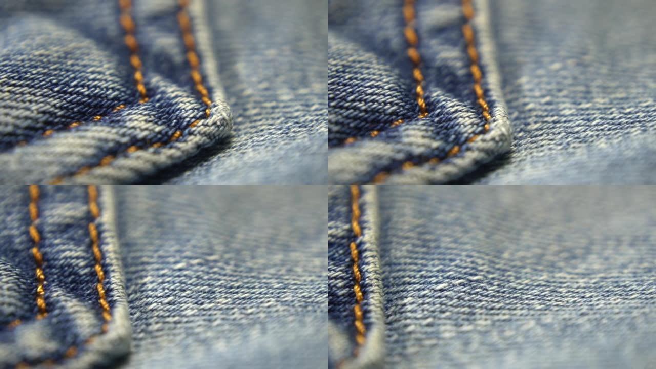 深色牛仔裤蓝色牛仔裤纹理背景。细节和高分辨率的织物纹理。