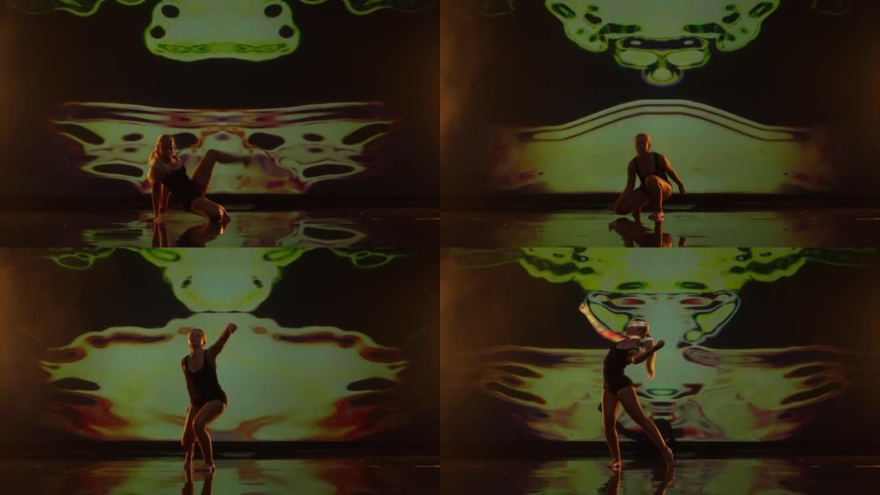 在工作室舞台上，艺术年轻女子在黑暗的动画背景下跳舞