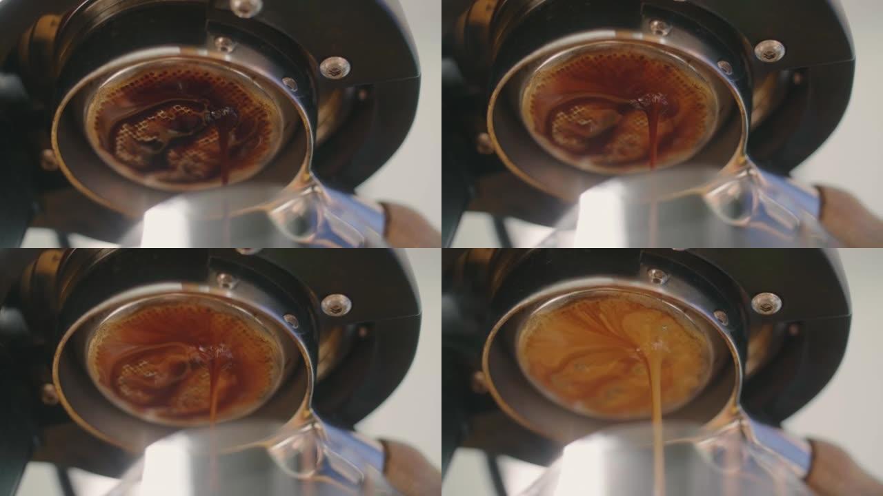 咖啡从机器滴入杯子。