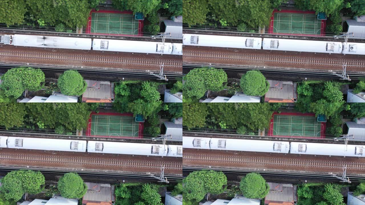 现代旅客列车在高速，自上而下的鸟瞰图中穿越框架