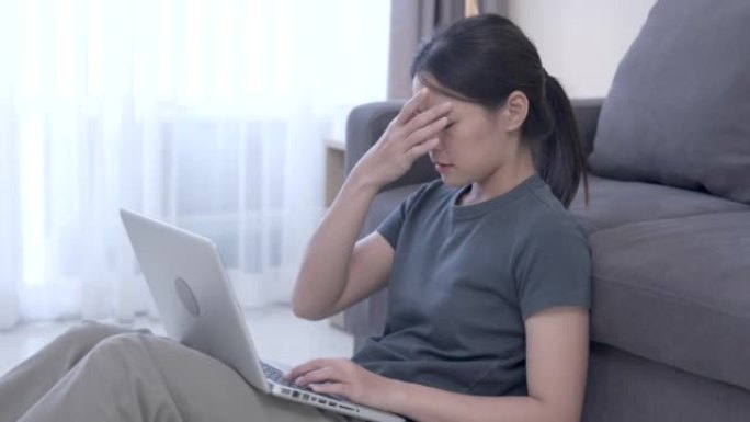 Asian women working at home, She has stress from w