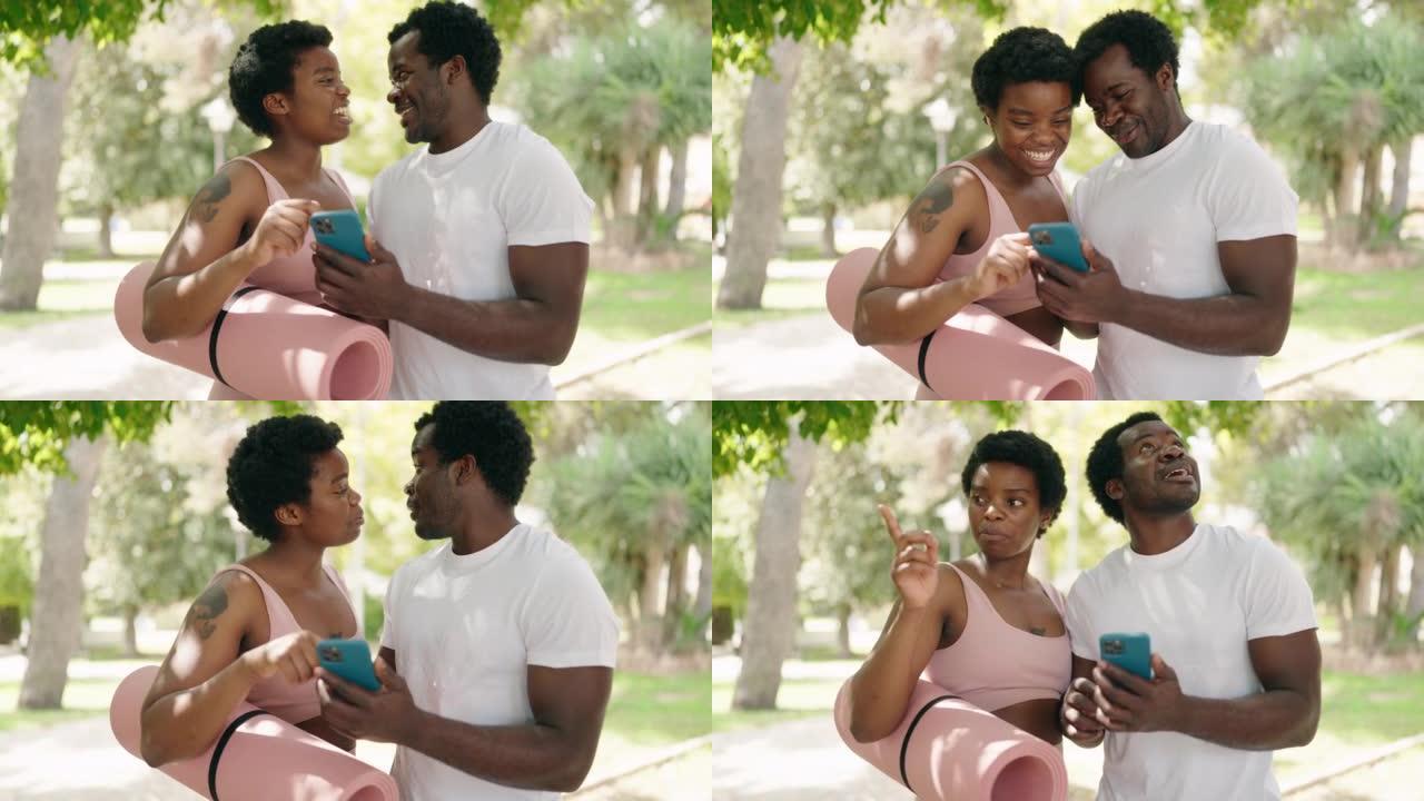 African american man and woman couple holding yoga