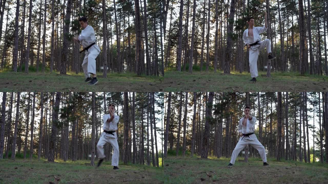 男子在森林里训练空手道一名男运动员karateka高加索练习者白天在森林里做自然的卡塔真正的人