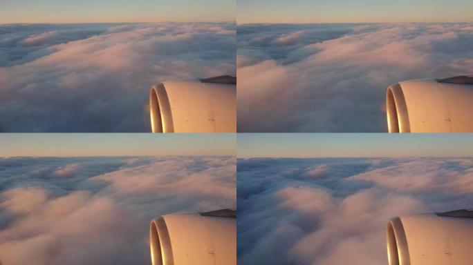 从喷气式飞机a330上的云层上方鸟瞰图。其中一个大引擎清晰可见