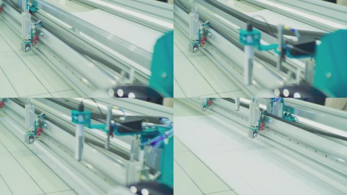 工业服装厂激光切割专用织物切割织物的某些部分。激光机，自动切割