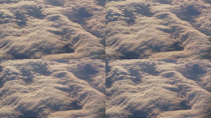 View Through Plane Window on Beautiful Sea of Fluf