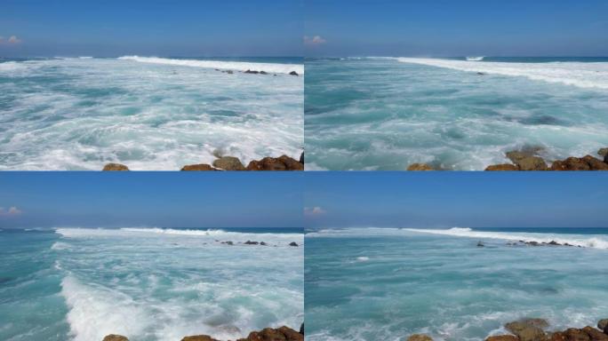 海浪在远处破裂，白水向岸边奔去，大射