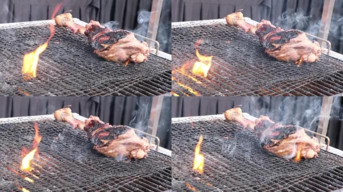 烤羊肉羊腿用火烧