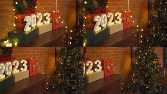 2023新年庆祝标志在晚宴上与礼物在圣诞节前夕圣诞节在家里的假期。生活方式